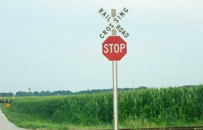 railroad crossing and stop sign 