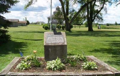 stone marker in park